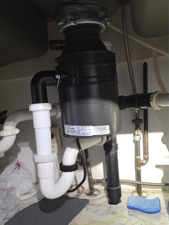 Garbage disposal, a real Old School Plumbing job